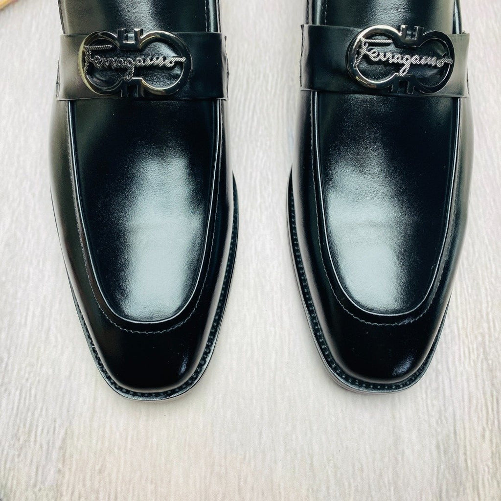 Ferragamo Black Metal-Accent Loafers — detail