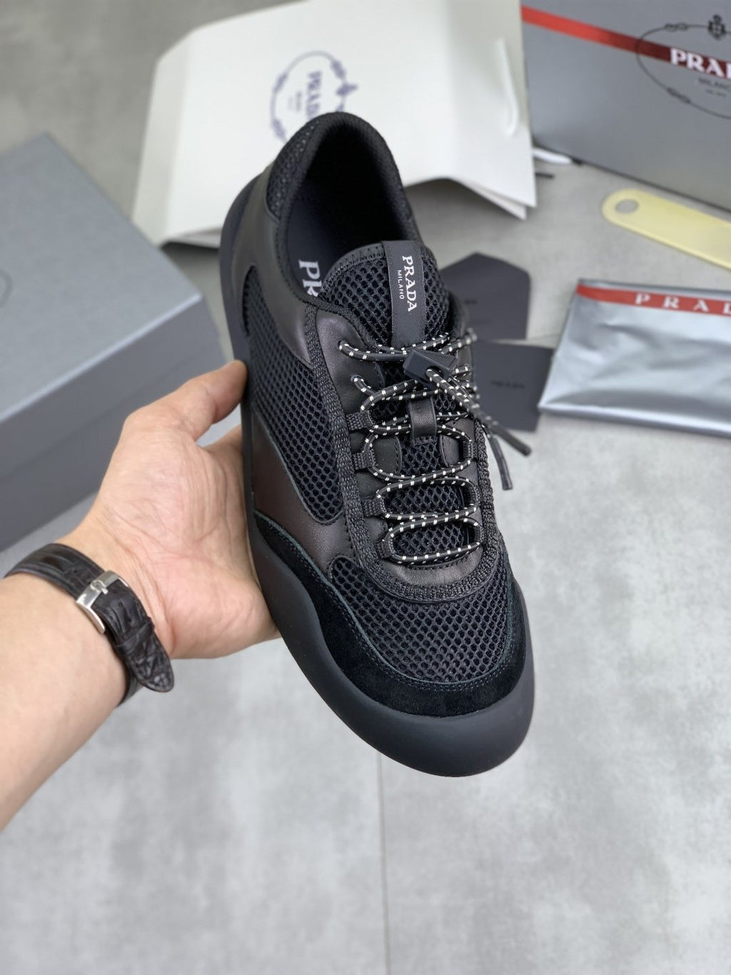 Prada Paneled Low-Top Sneakers — model