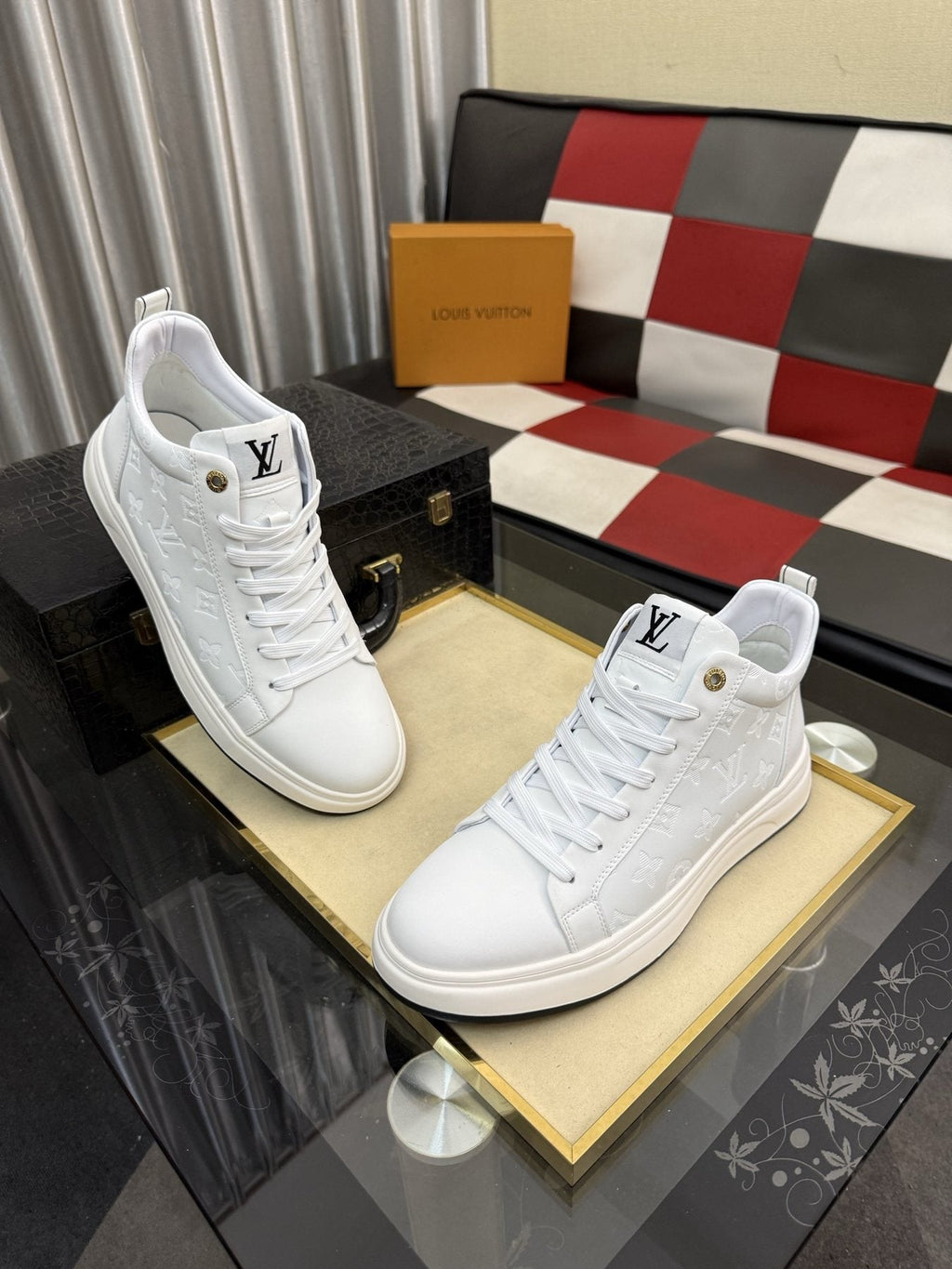 Louis Vuitton Embossed High-Top Sneakers — front